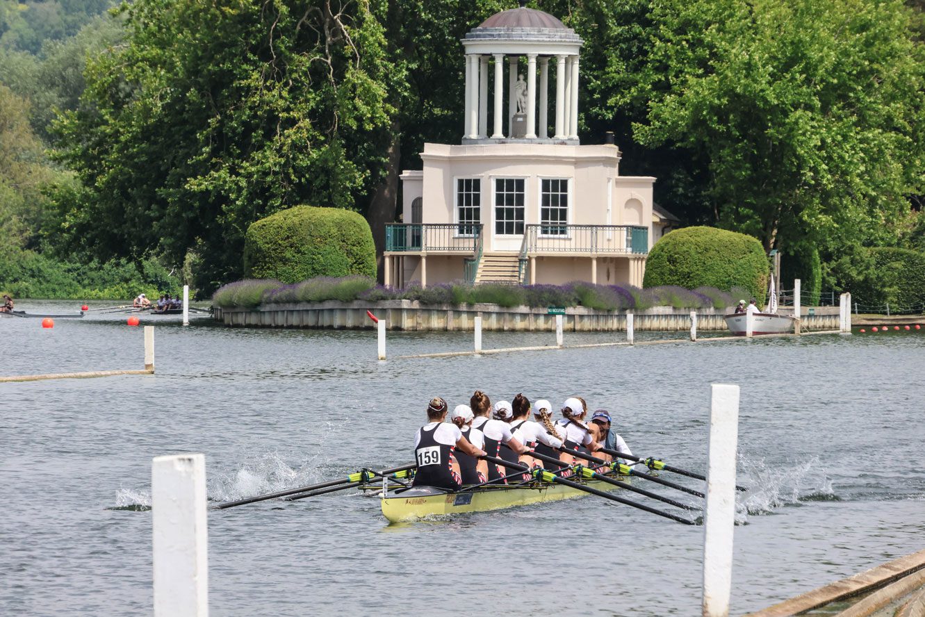 Women's eighht racing with Temple Island in background
