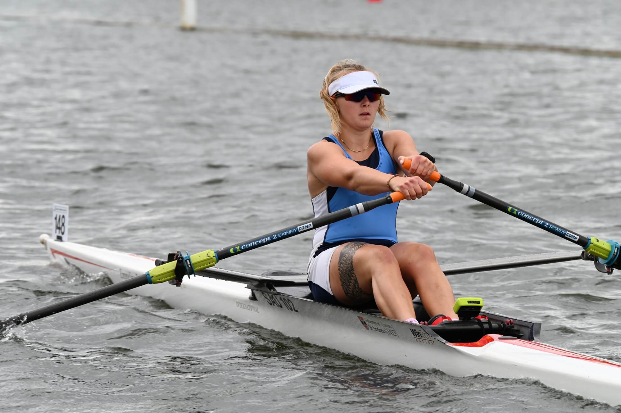 woman racing in single scull
