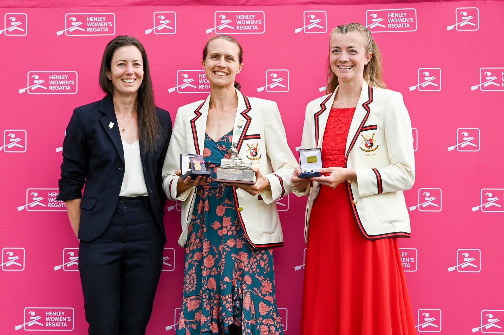 Woman with medal and trophy