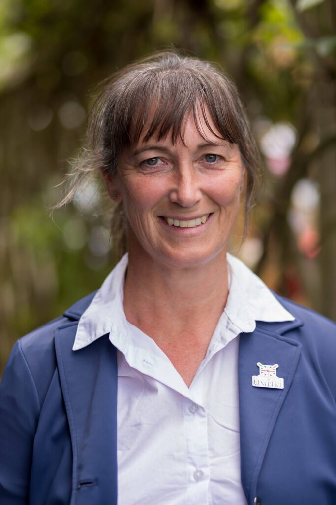 Smiling female Umpire
