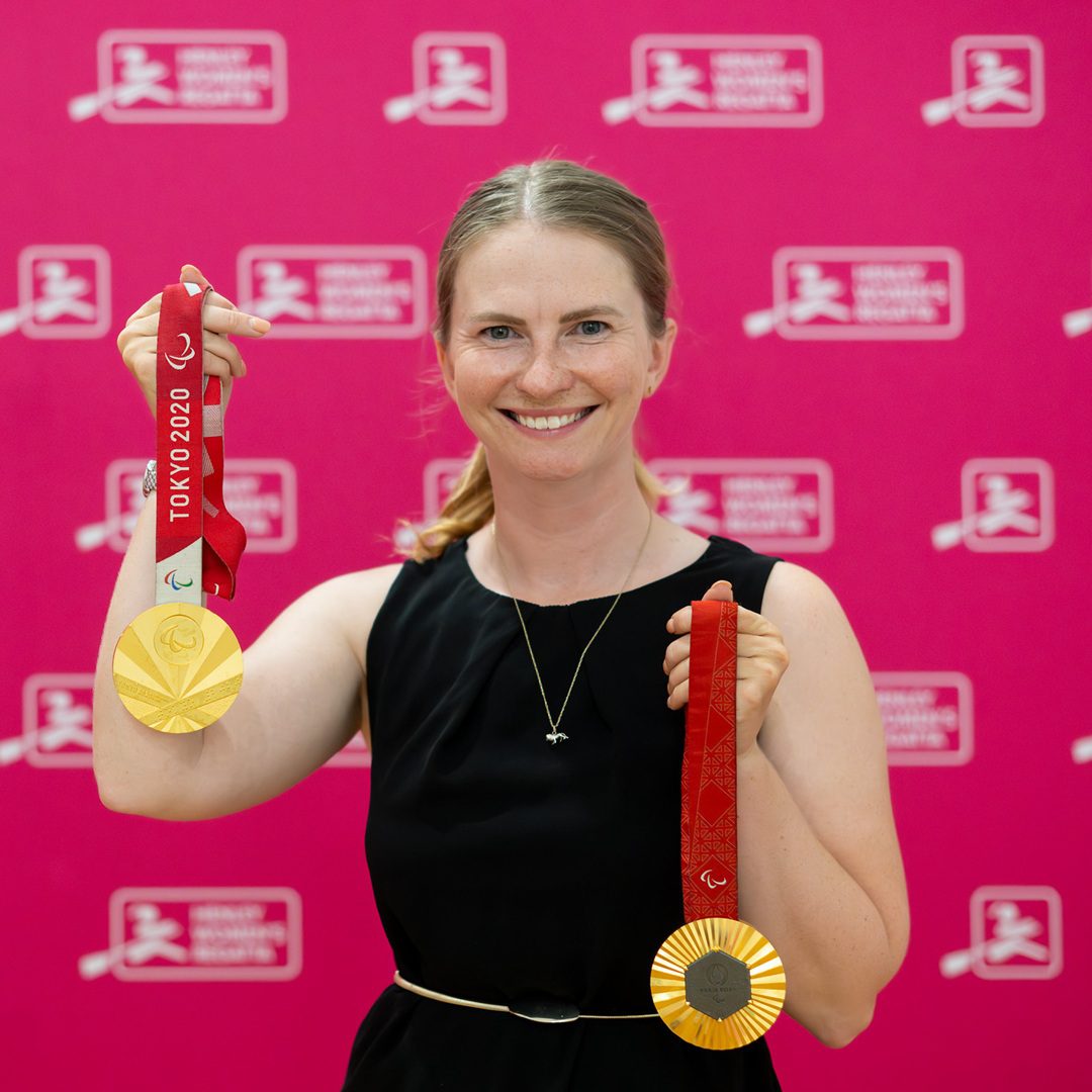Erin Kennedy with 2 Paralympic gold medals