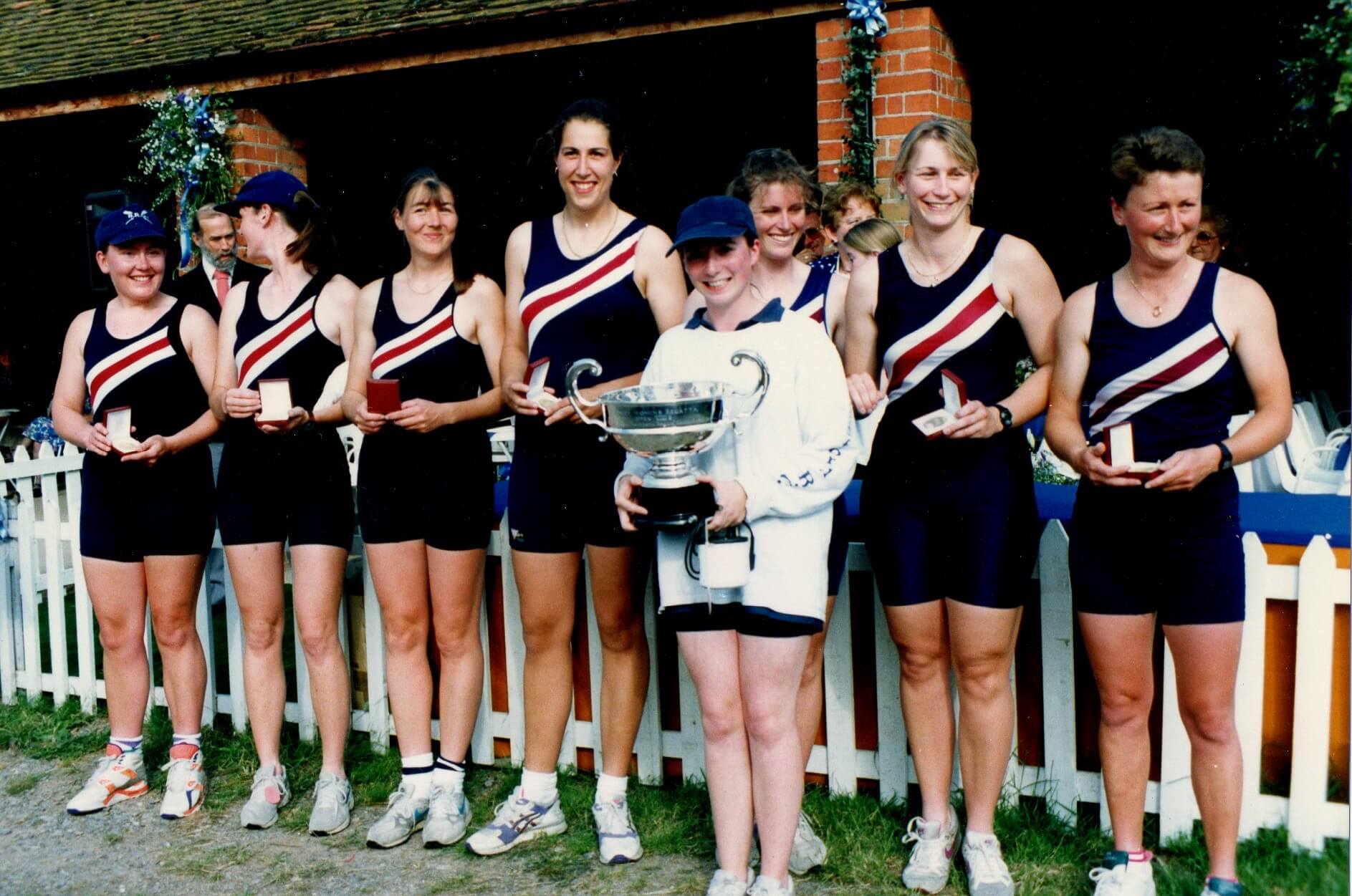 Women's eight with large silver trophy