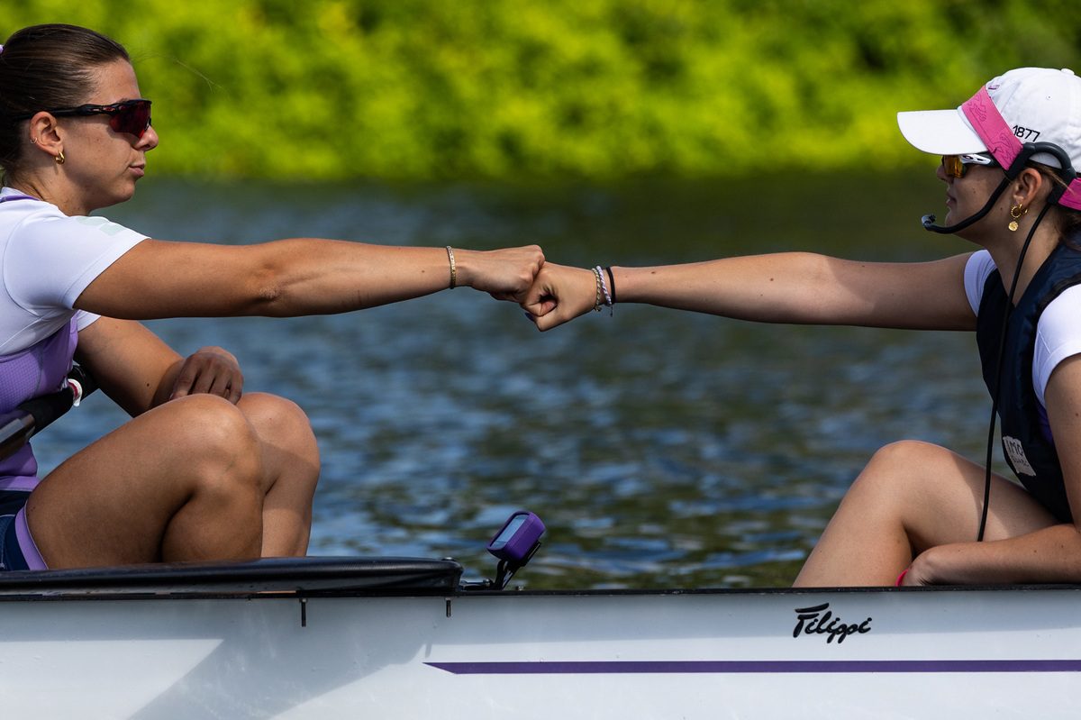 Stroke and cox fist bumping