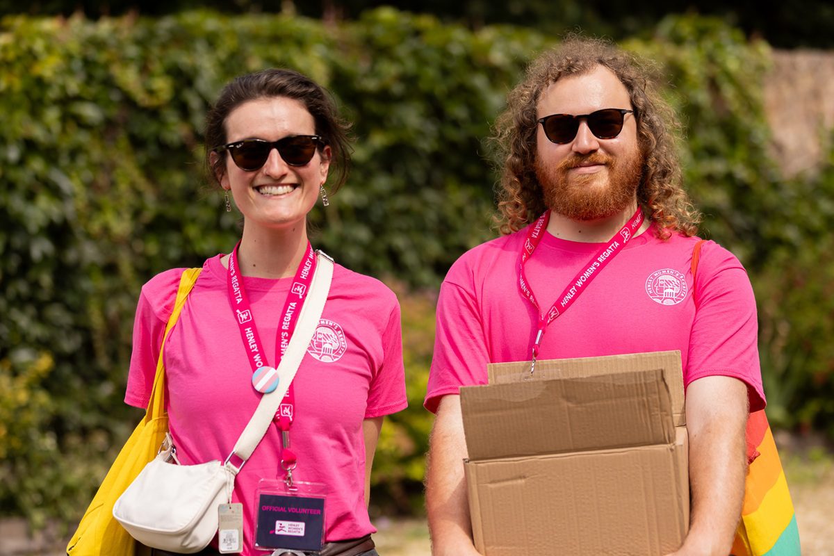 2 HWR volunteers in pink t-shirts