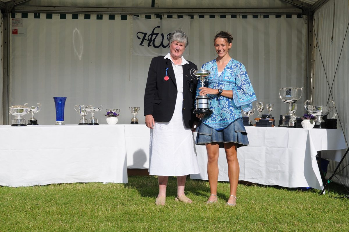 woman with medal and trophy 2008