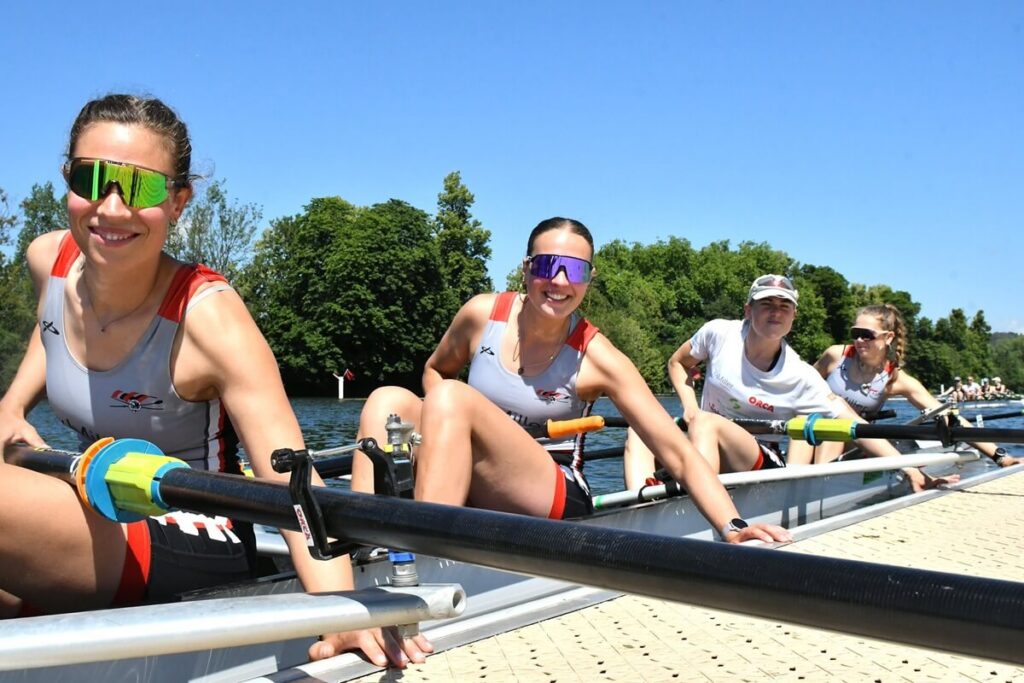 Crew pushing off landing stage